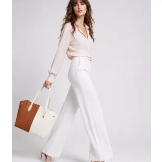 Woman carrying EMLONC Verity white and mocha designer tote bag